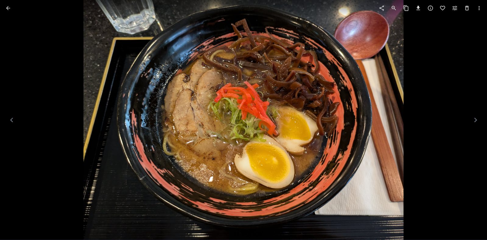 A photo of a bowl of ramen open in the Immich photo viewer