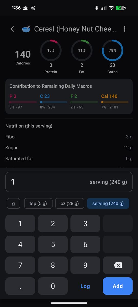 Food detail for a cereal, with macro rings, a contribution-to-remaining card, portion units and a number pad